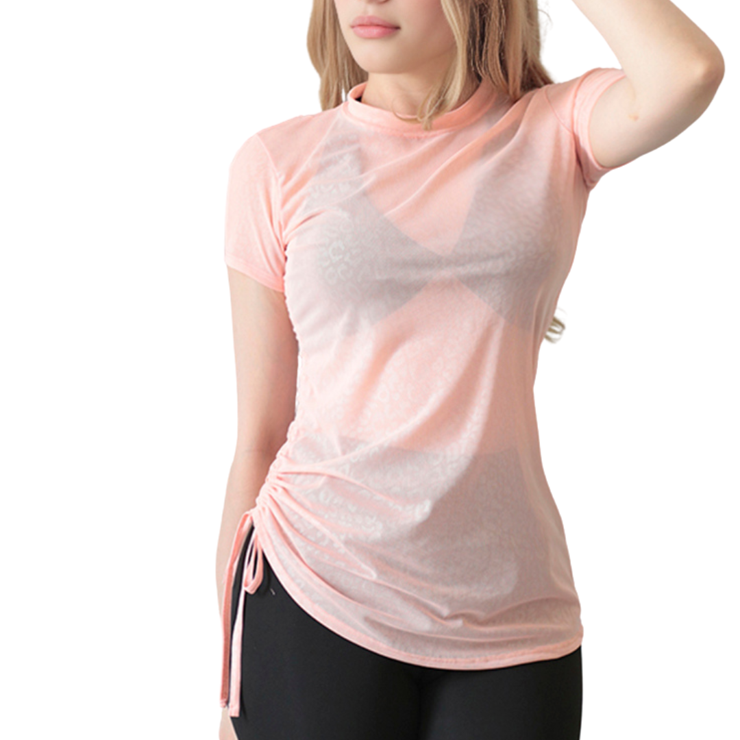 Blusa deportiva para mujer, manga corta con espalda en transparencia, textil lycra transpirable mesh transparente. Color melón | Adriana Olimpo