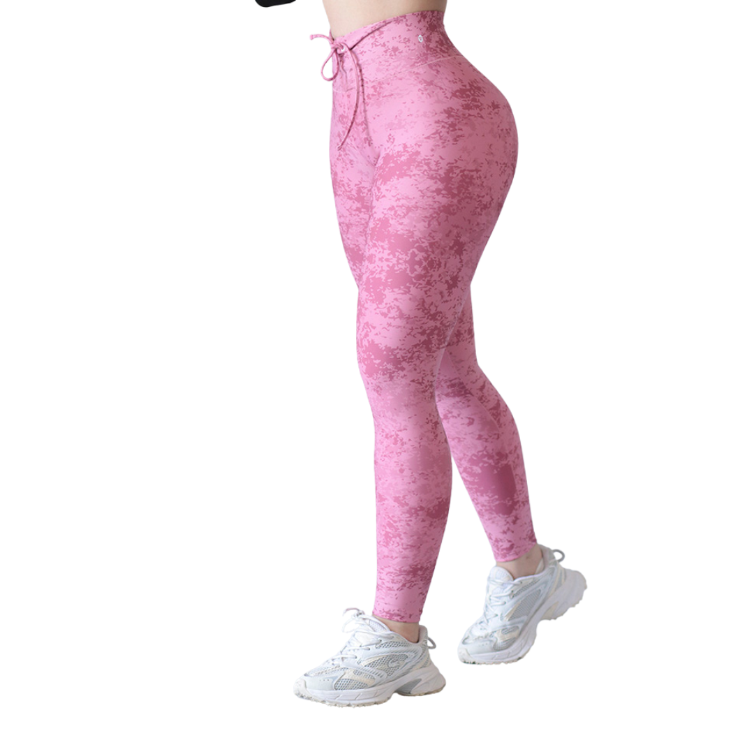 Leggings deportivos Suplex para mujer, efecto push up con cintura alta, textil lycra transpirable con acabado liso distorsión. Color rosa | Adriana Olimpo
