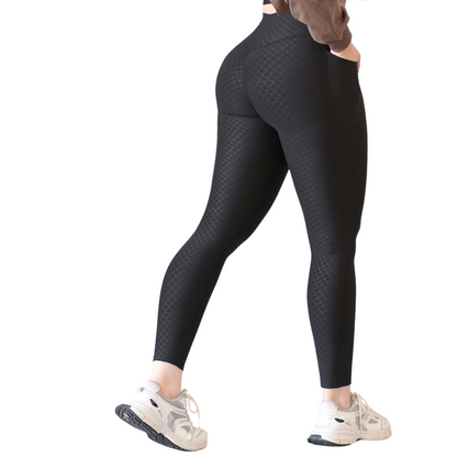Leggings Deportivos para Mujer Fitness: Efecto Push Up, Cintura Alta, Con Bolsillos Laterales, Textil Lycra Transpirable con Relieves Fish,  Color Negro | Adriana Olimpo