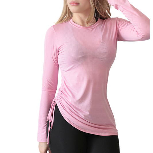 Blusa deportiva para mujer, manga larga, textil lycra transpirable microperforada. Color rosa | Adriana Olimpo