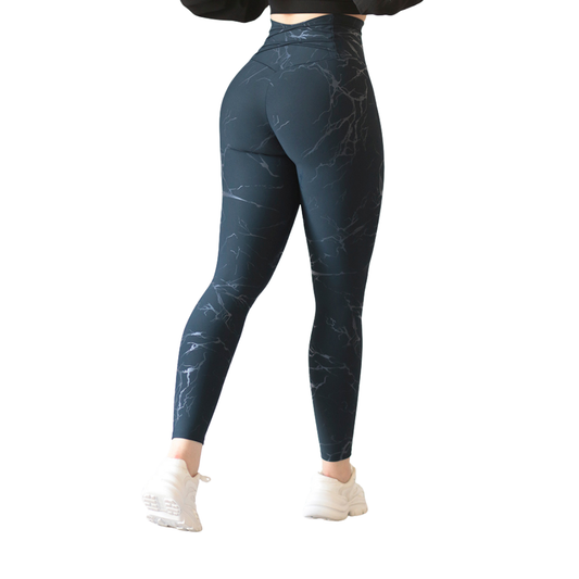 Leggings deportivos supplex para mujer, efecto push up con cintura alta, textil lycra transpirable con destellos ✨ y relieves de rayos. Color azul profundo | Adriana Olimpo
