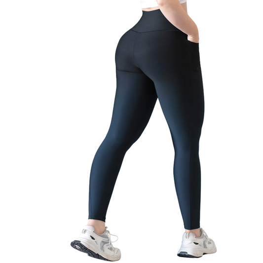 Leggings deportivos supplex para mujer, efecto básico con cintura alta, bolsillos laterales y textil lycra transpirable con acabado liso. Color azul degradado | Adriana Olimpo