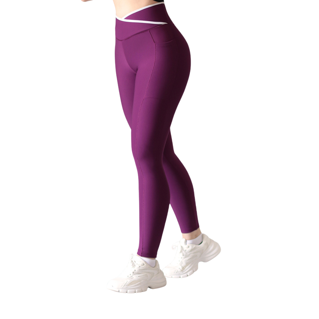 Leggings deportivos supplex para mujer, efecto básico con cintura alta, bolsillos laterales y textil lycra transpirable con acabado liso. Color purpura | Adriana Olimpo