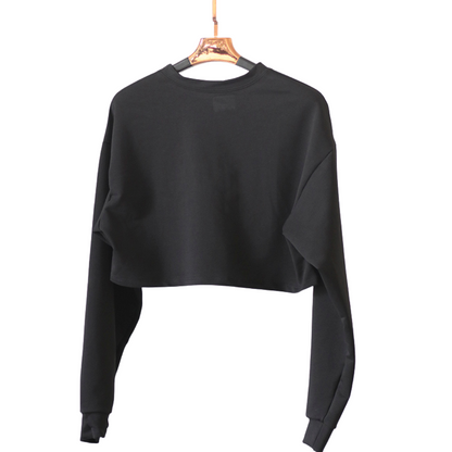 Sudadera deportiva para mujer, manga larga, textil algodón transpirable con acabado liso. Color negro | Adriana Olimpo
