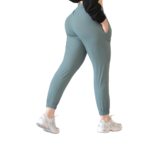 Joggers Deportivos para Mujer Fitness: Efecto Básico, Cintura Alta, Con Bolsillos Laterales, Textil Lycra Transpirable con Acabado Liso, Color Mentolado | Adriana Olimpo