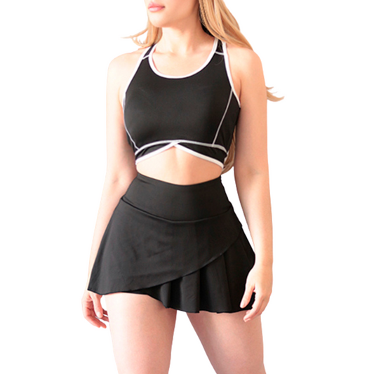 Conjunto deportivo supplex para mujer, falda short, textil lycra transpirable con acabado liso. Color negro | Adriana Olimpo