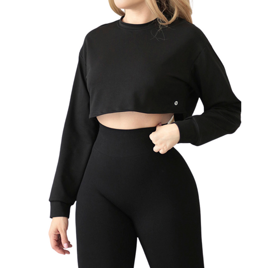 Blusa deportiva para mujer, manga larga, textil lycra transpirable con acabado liso. Color negro | Adriana Olimpo