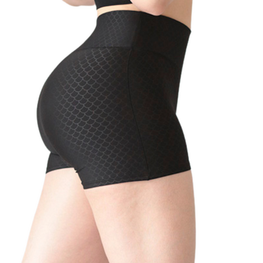 Short deportivos para mujer, efecto básico con cintura alta, textil lycra transpirable con relieves de sirena. Color negro | Adriana Olimpo